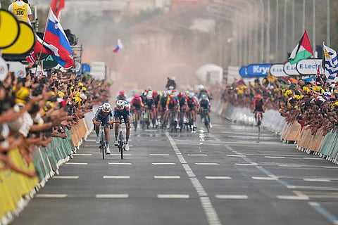 New overall leader Romain Bardet and teammate Frank van den Broek